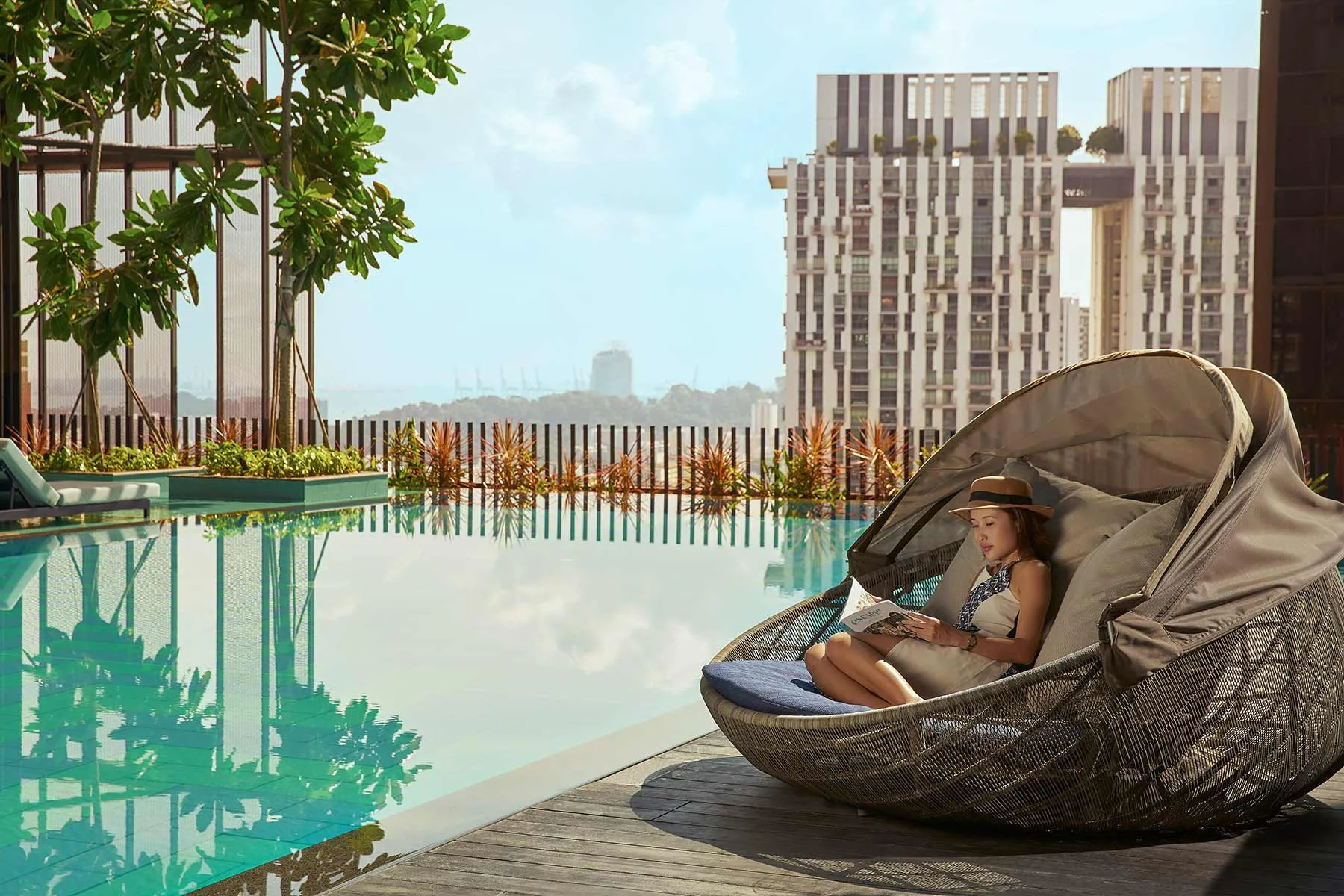 imgi_55_oasia_hotel_downtown_singapore_preview_image_infinity_pool_with_talent